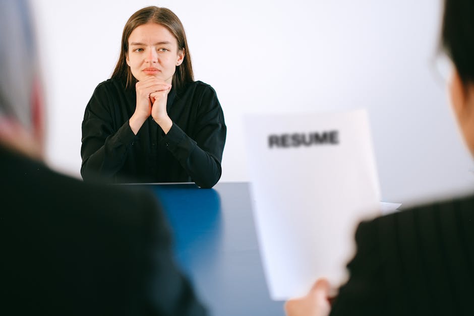 Arab professionals discussing CV and interview preparation office