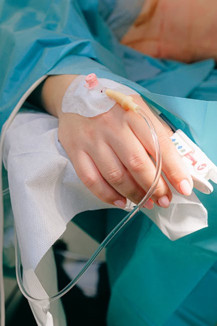 doctor hospital room antiviral treatment patient IV infusion