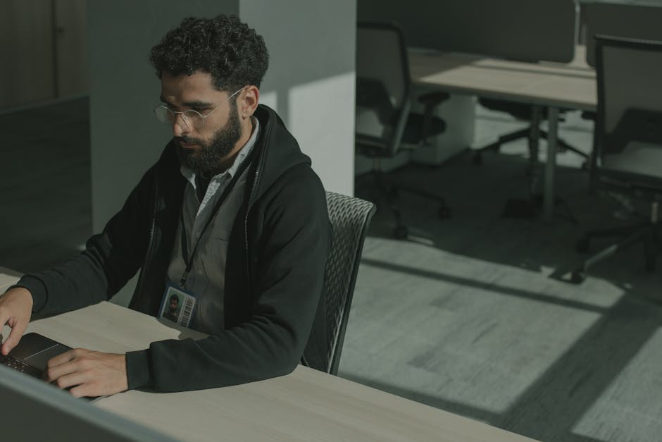 indie game developer workspace arab team coding laptop