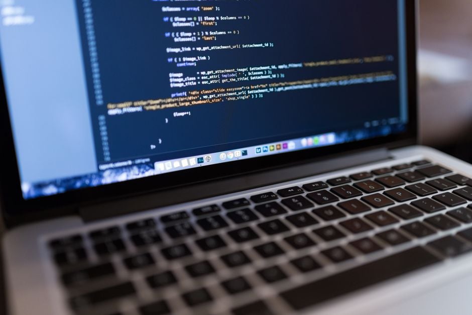 developer laptop terminal running code, command line, modern workspace