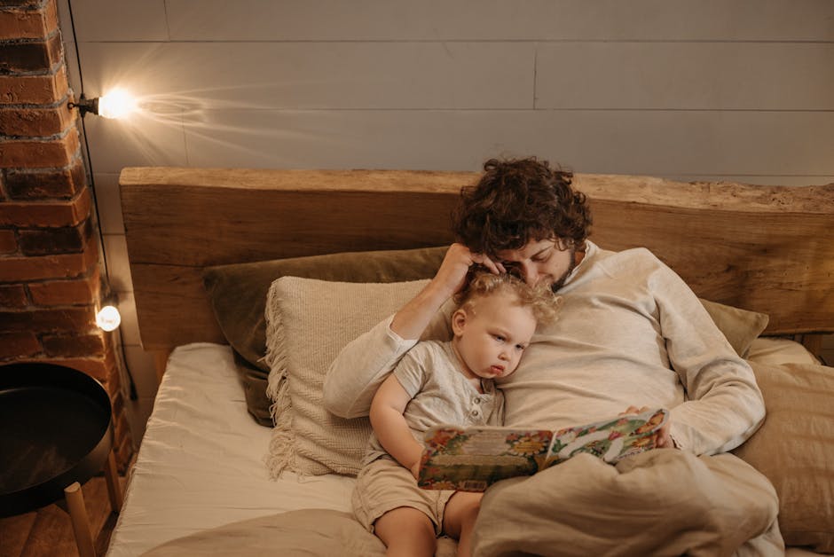 parent bedtime routine baby reading book crib