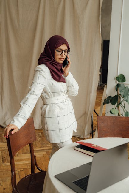 Arab freelancer laptop workspace planning pricing packages