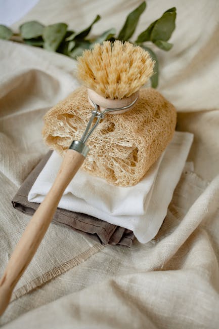 Stylish eco-friendly bath essentials featuring loofah and wooden brush.
