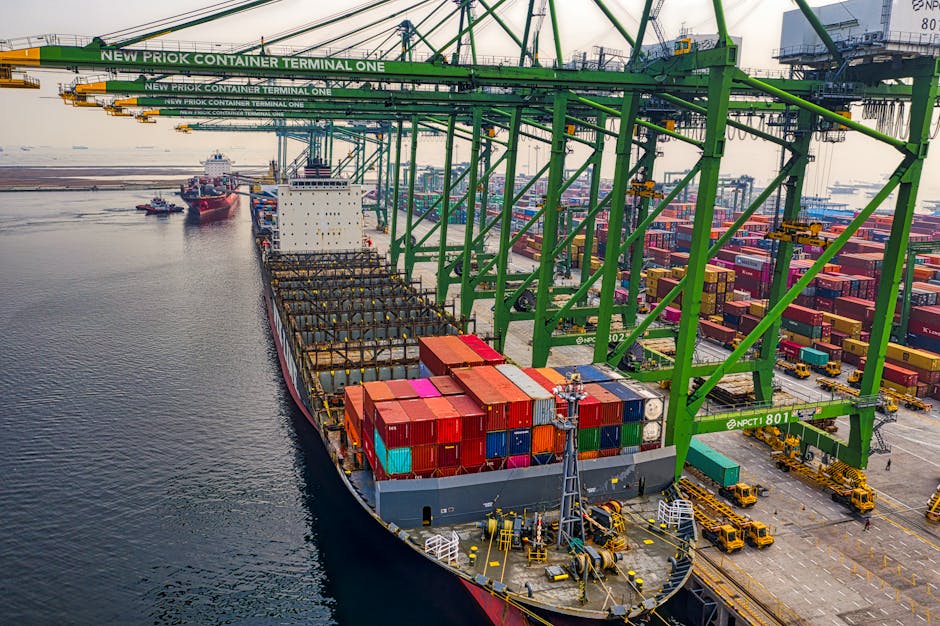 business team laptop invoice payment terminal shipping container port