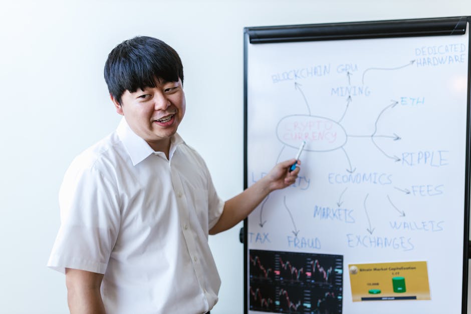A professional explaining cryptocurrency concepts on a whiteboard during a seminar.