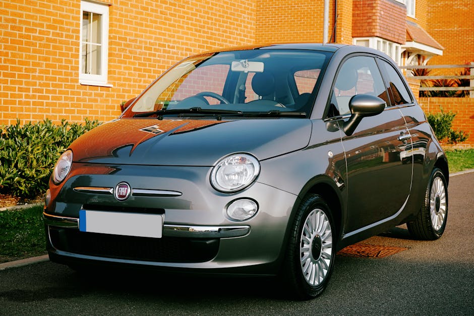 city electric hatchback compact car street pexels