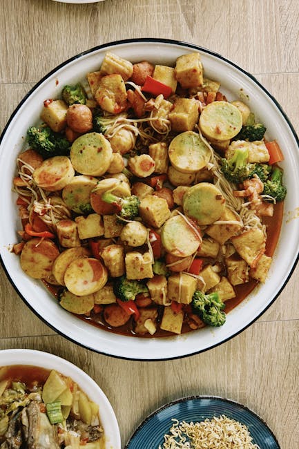 A colorful vegan stir fry featuring broccoli, tofu, and sweet potatoes, perfect for a wholesome meal.