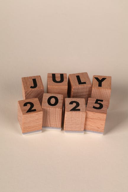 Wooden blocks arranged to show the date July 2025, perfect for calendar and date concept images.