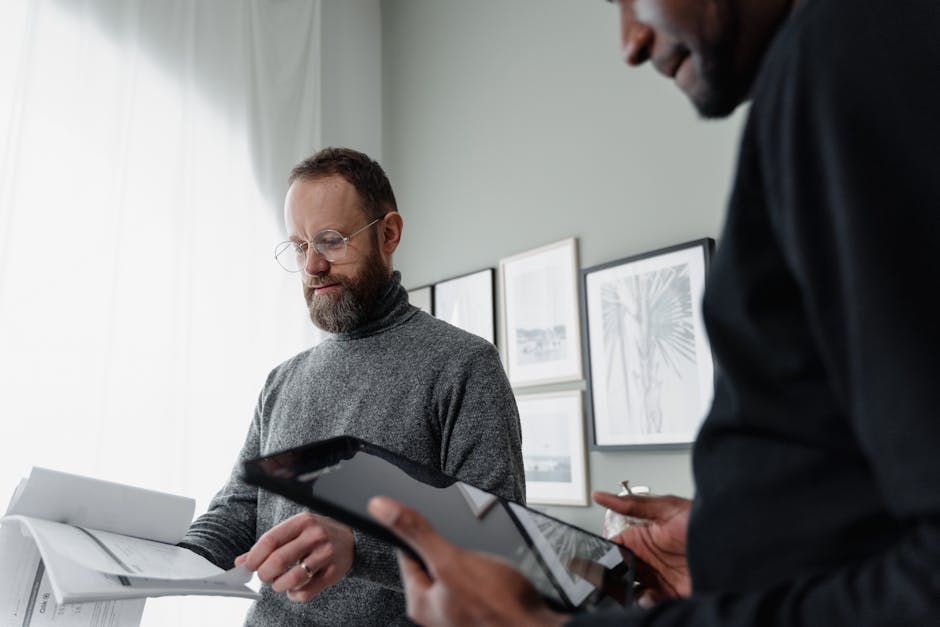 Gulf professionals negotiating salary office documents Pexels