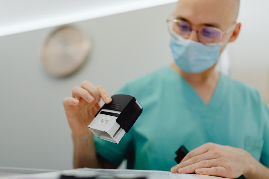 Healthcare worker stamping documents in a clinic setting, ensuring efficient workflow.