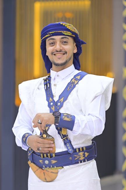 A Yemeni groom proudly wearing traditional attire, showcasing cultural heritage.