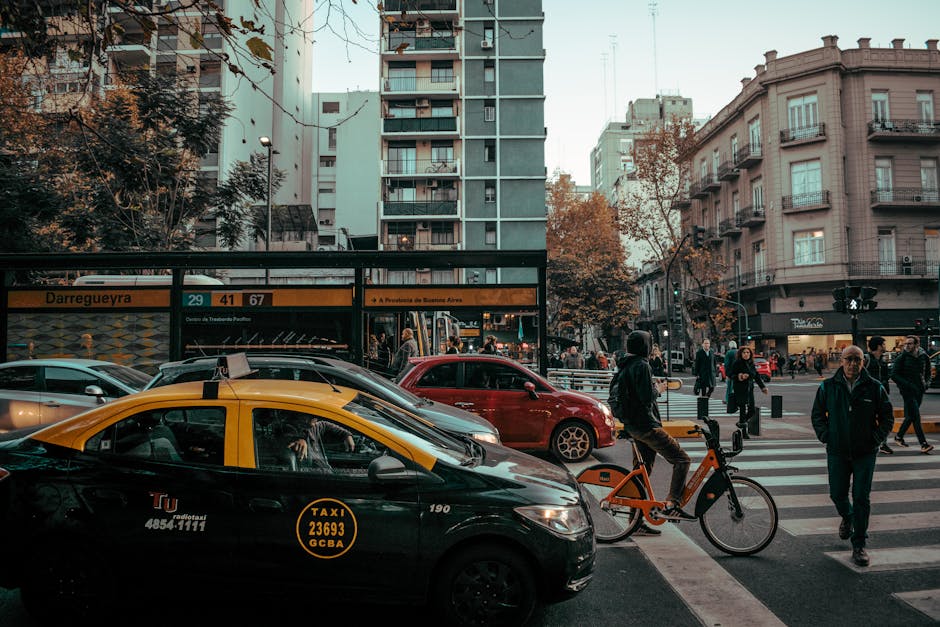 urban protected bike lane cyclists pedestrians Pexels