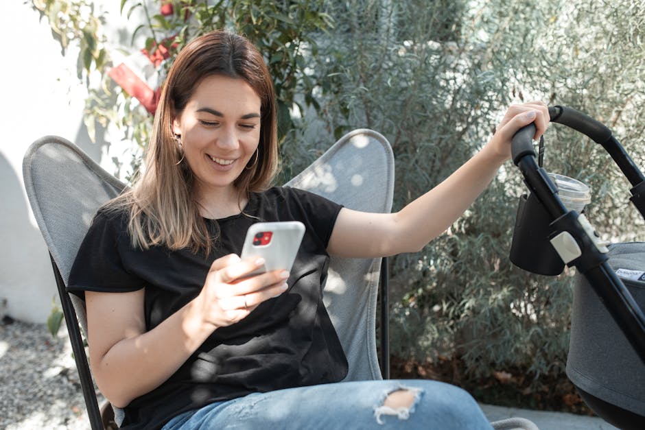 smart stroller sensors close up parent using smartphone