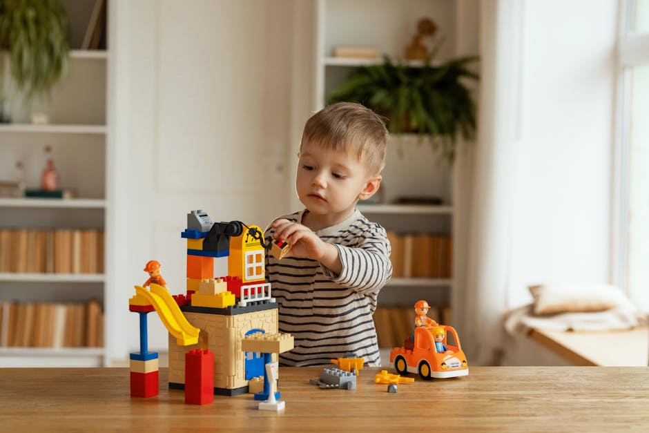 Young child playing creatively with building blocks indoors, fostering imagination and fun.