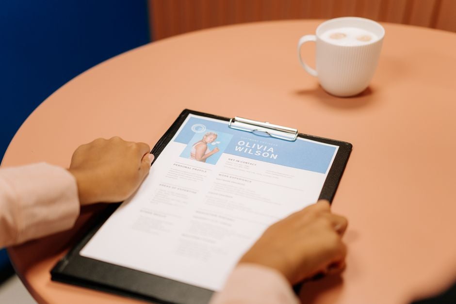 candidate interview AI overlay resume hands typing
