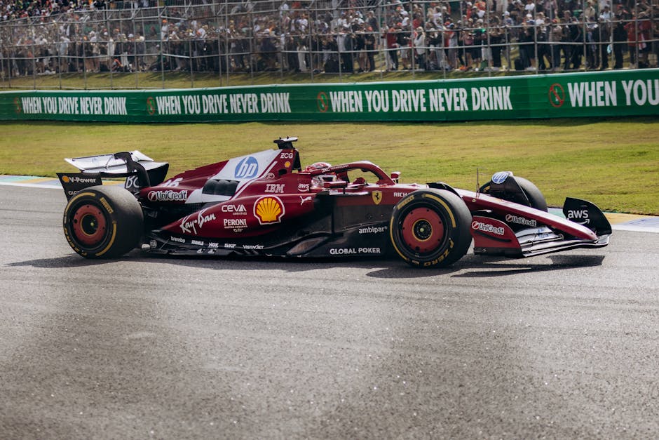 Ferrari racing car on the track at São Paulo Grand Prix, showcasing high-speed motorsport action.