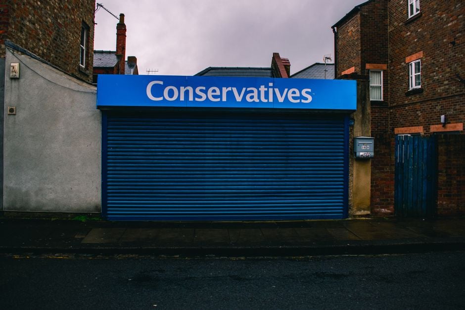 shop shutters closed during protest security guard storefront