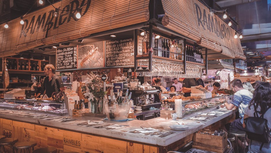Lively market food stall in Barcelona, capturing the vibrant culinary atmosphere.