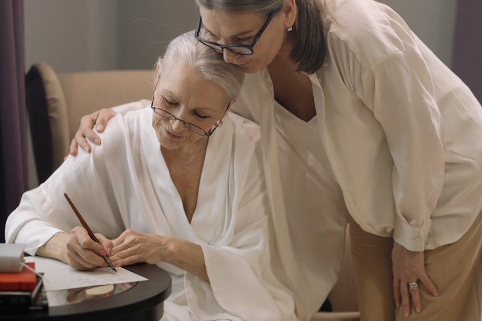 Elderly woman writing with support, showcasing friendship and care in a peaceful setting.