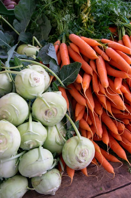 A vibrant display of fresh kohlrabi and carrots at a Berlin market, showcasing organic produce.