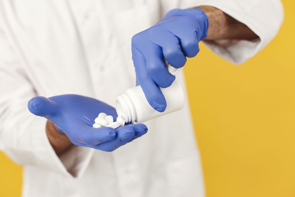 pharmacy antiviral pills pharmacist computer dispensing