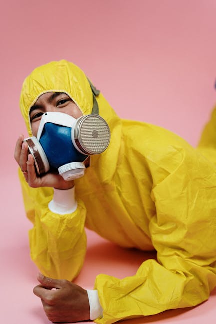 veterinarian wearing PPE on livestock farm biosecurity protective equipment
