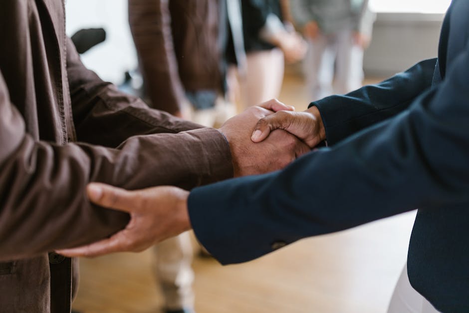 stadium corporate sponsorship investors handshake