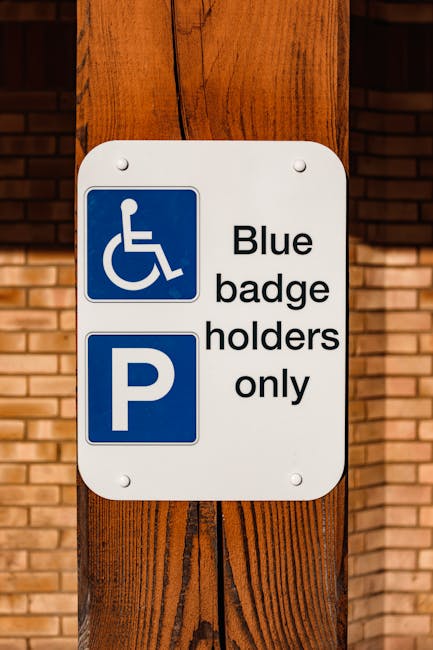 A sign indicating parking for blue badge holders only, outdoors.