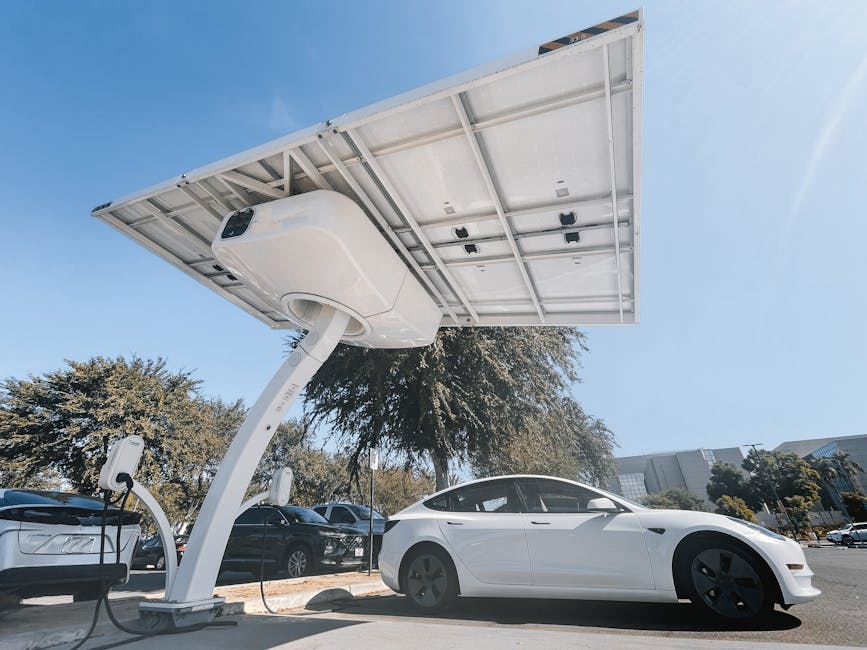 EV charging station at Abu Dhabi building with solar panels rooftop