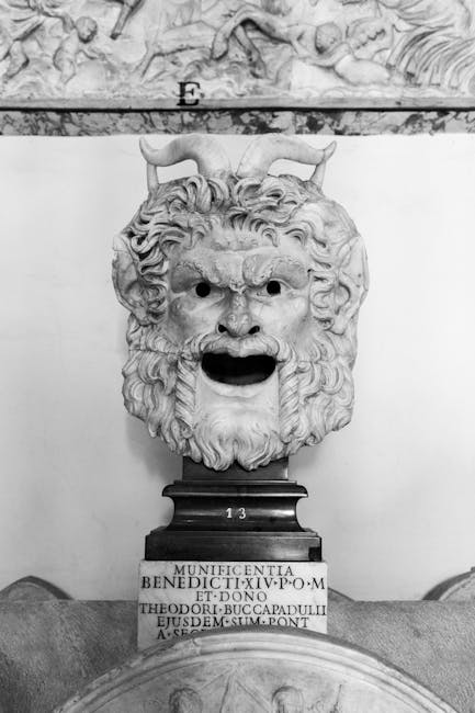 Black and white photo of an ancient Roman marble sculpture displayed in a museum.