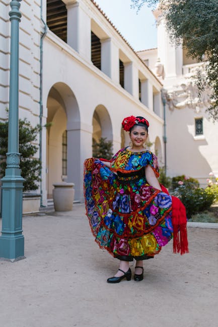 Vibrant traditional Mexican dress worn during a fiesta, showcasing cultural heritage outdoor setting.