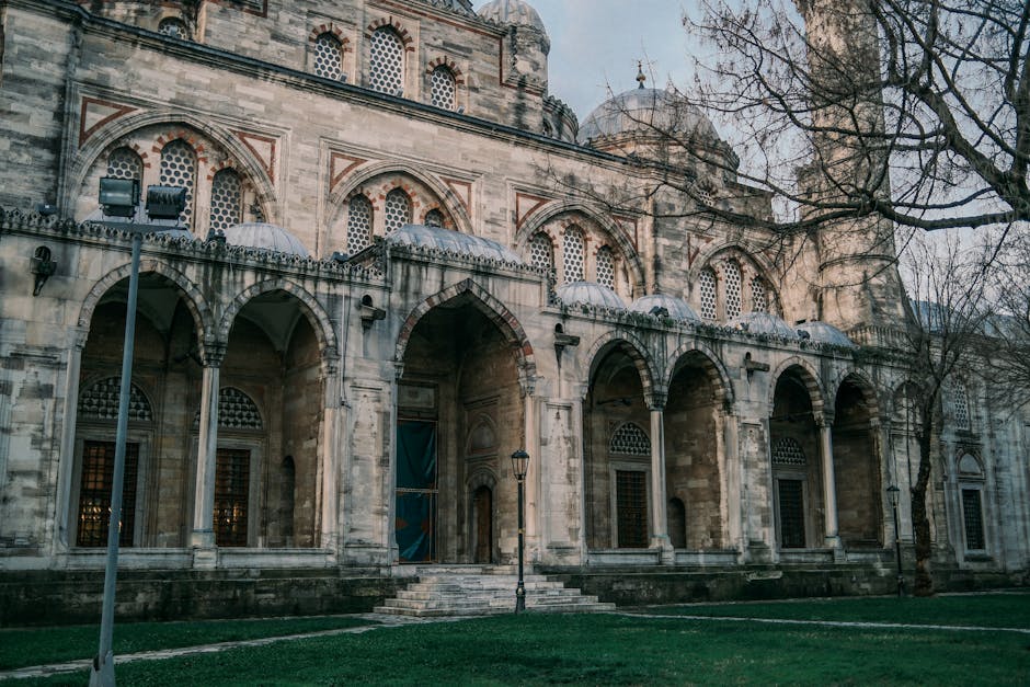 A close-up view of the historic Ottoman mosque with intricate arches in Istanbul.