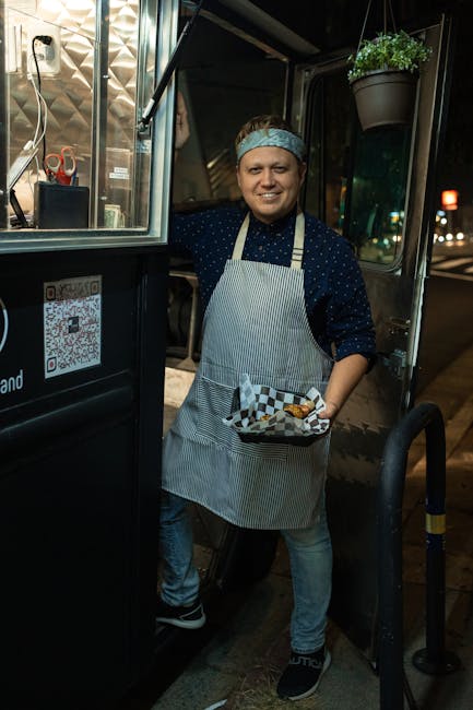falafel food truck chef serving customers outdoor market
