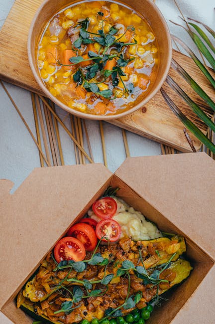 Delicious vegetarian food in a sustainable package with fresh vegetables and soup.