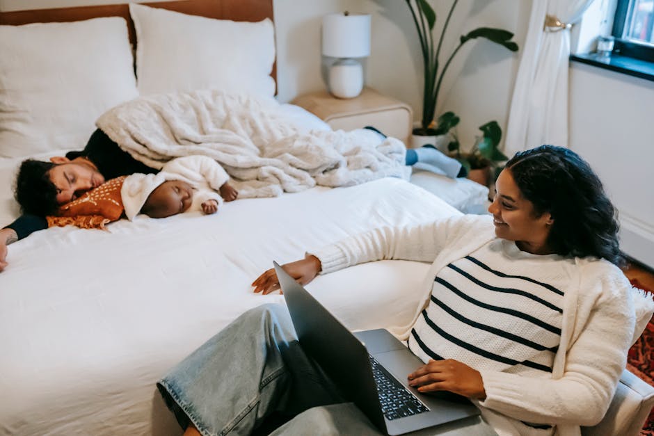 working parents office Arabic mother father baby laptop