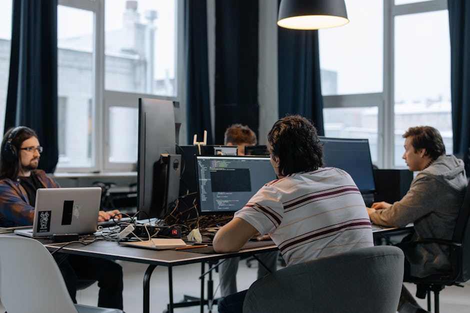 Arab game studio team meeting developers office pexels