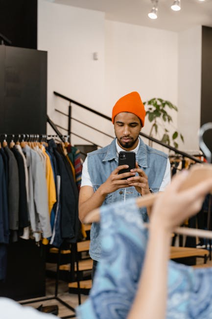 customer signing phone subscription contract in a Middle East smartphone store