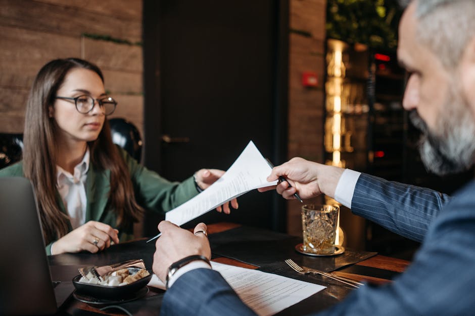 professional salary negotiation meeting papers exchange offer