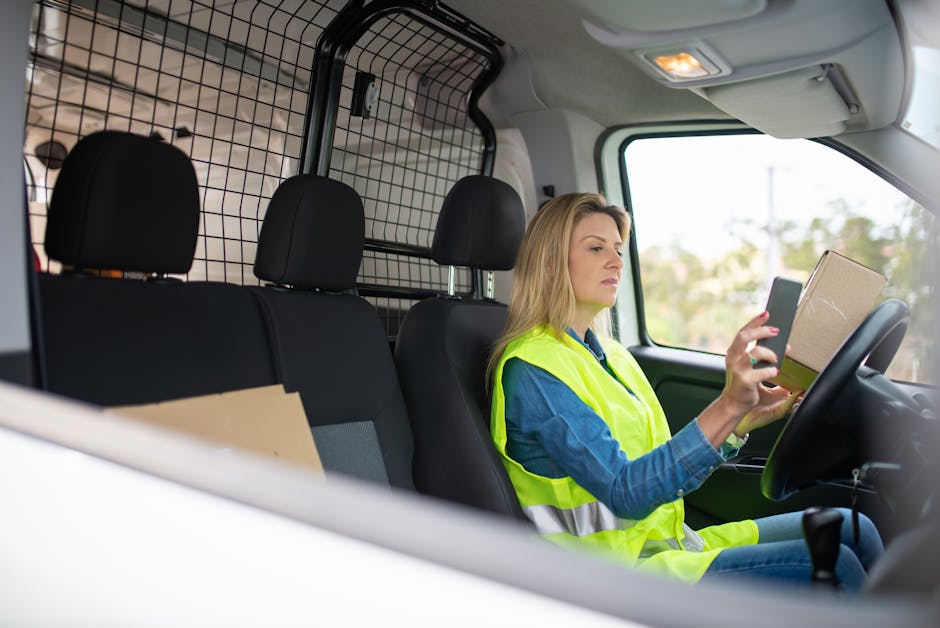 delivery driver using tablet real-time tracking dashboard urban van