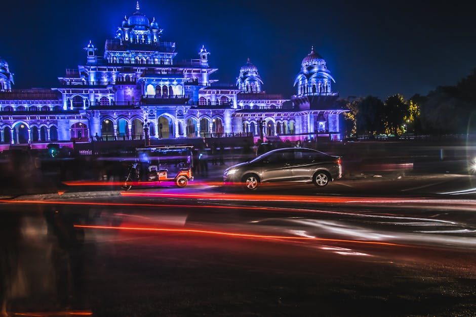 Long exposure of Albert Hall Museum in Jaipur at night with light trails.