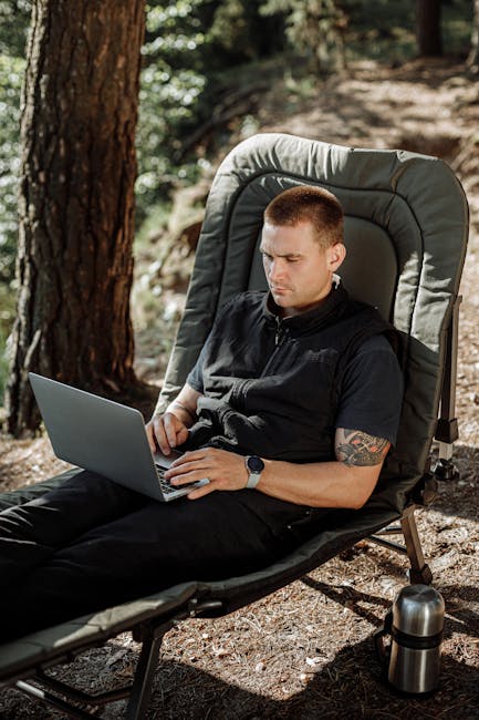 person on laptop booking travel site AI overlay