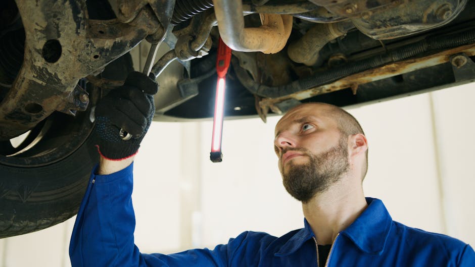 technician inspecting EV fast charger port repair