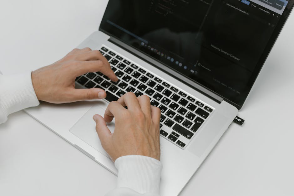 developer implementing passkeys WebAuthn code laptop security key