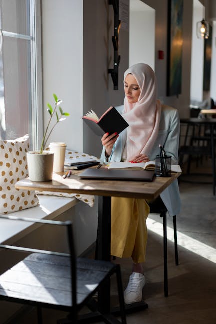 Arab woman learning online AI laptop study