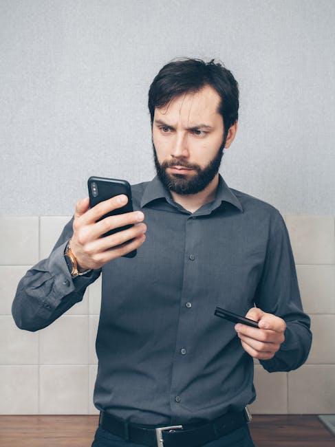 woman smartphone concerned studio portrait