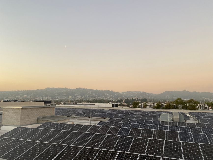 Scenic view of solar panels on a rooftop at sunset in Los Angeles, California.