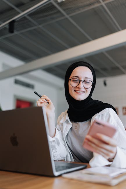 Arabic developer mobile phone app privacy code laptop Arabic text