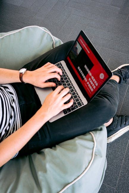 remote worker laptop Abu Dhabi skyline coworking freelancer