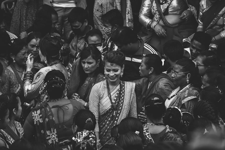 A vibrant gathering of people in traditional attire at a festival in Kathmandu, Nepal.