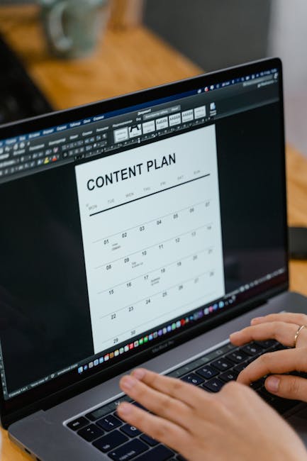 editorial calendar laptop desk planning content schedule